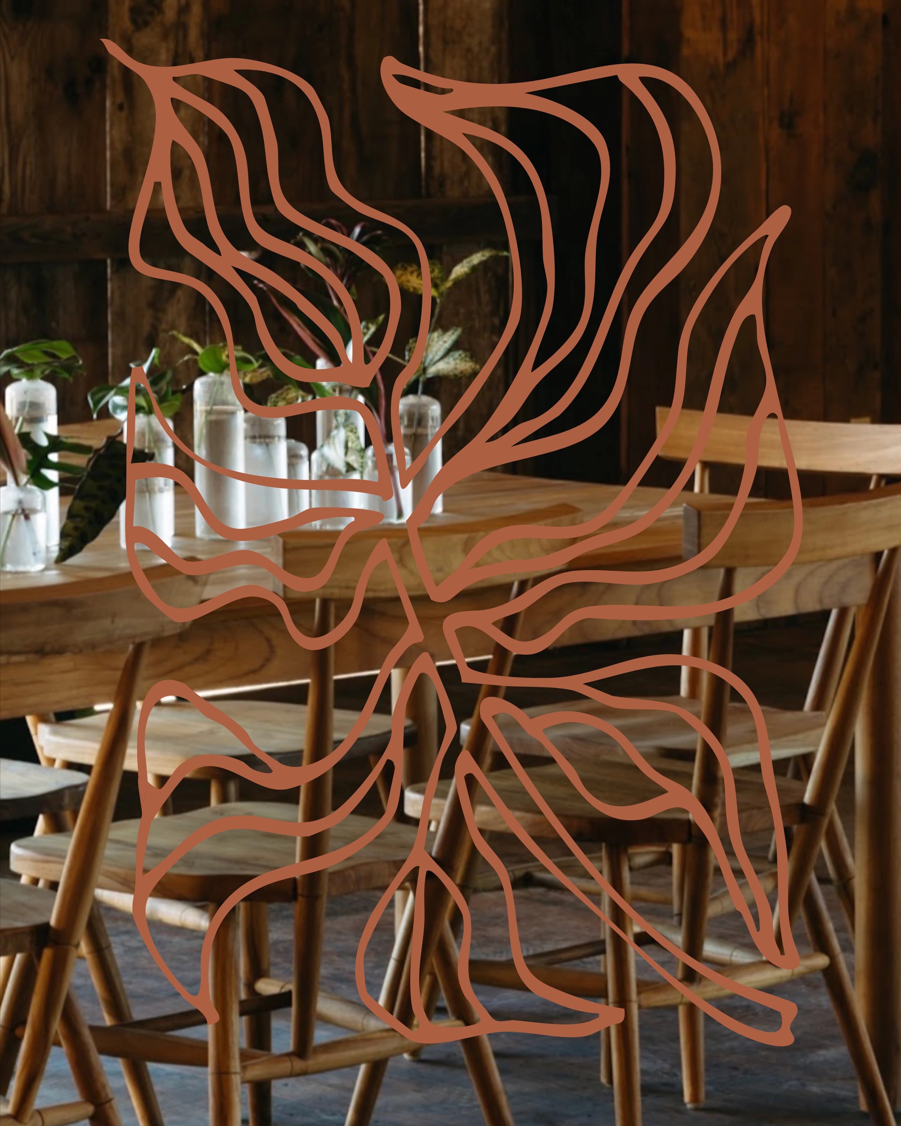 Wood tables styled with small plant arrangements in a warm interior.